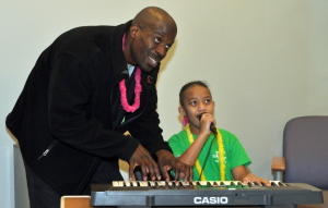 Joe Marbell, LPN and Ladik check out their Karaoke skills at the Pediatric Medical Rehab Unit at the Children’s Center Rehabilitations Hospital.