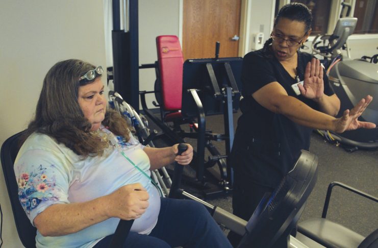 Vickey McDonald works with physical therapist Ana Stone, PT, at Valir PACE. PACE therapists say Vickey is one of the hardest workers they know in physical therapy, overcoming seemingly insurmountable odds.